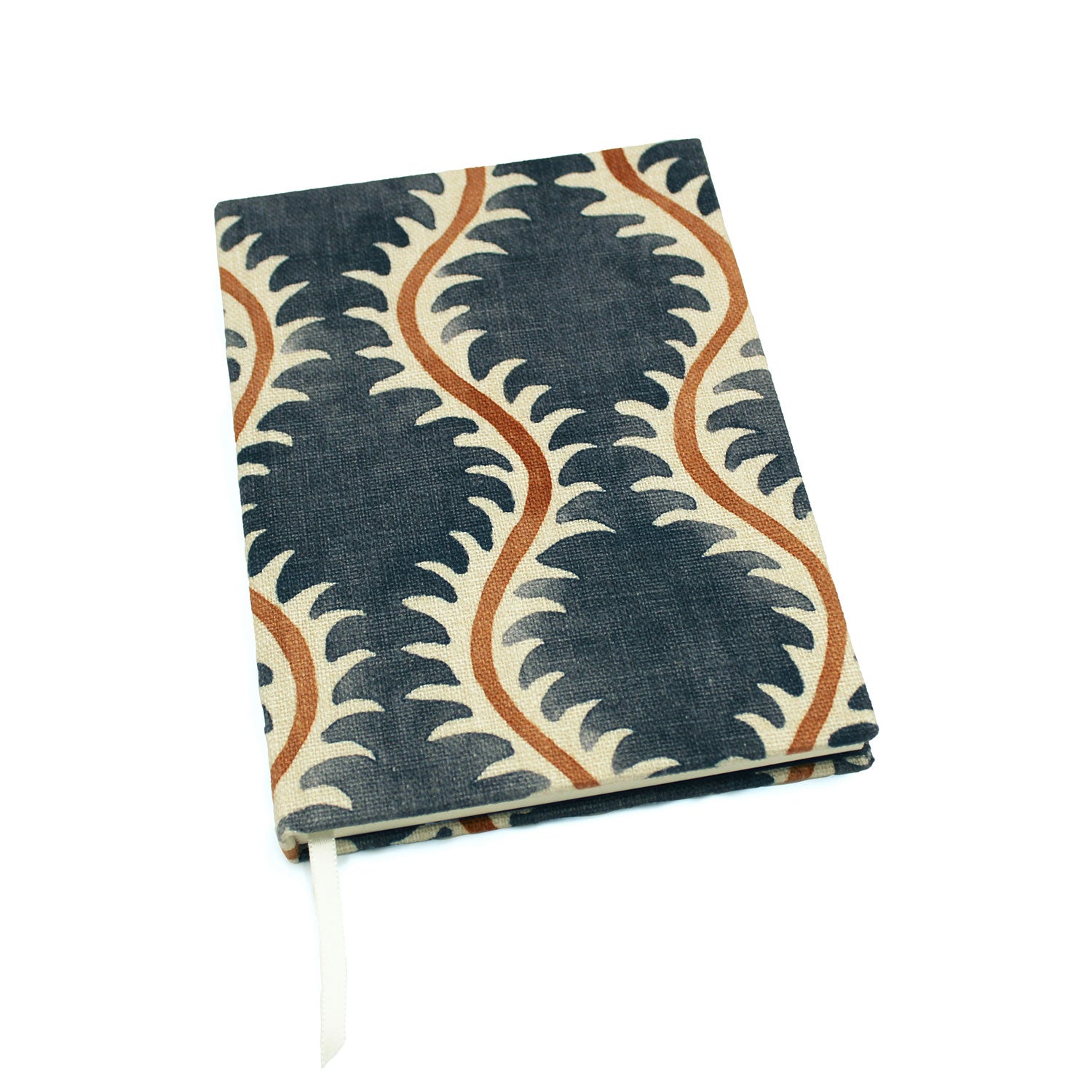 A blue, brown and cream linen notebook with a classic trellis pattern.